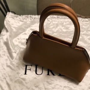 Furla  tan leather hand bag.